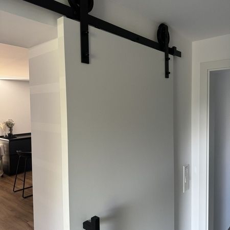 Referenzen - Schiebetür aus Holz